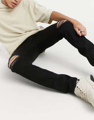 ASOS DESIGN skinny jeans in black with knee rips