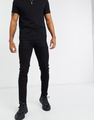 black polo and black jeans