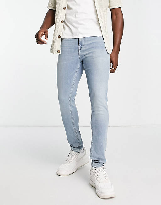 ASOS DESIGN - Skinny jeans in blauw met light wash
