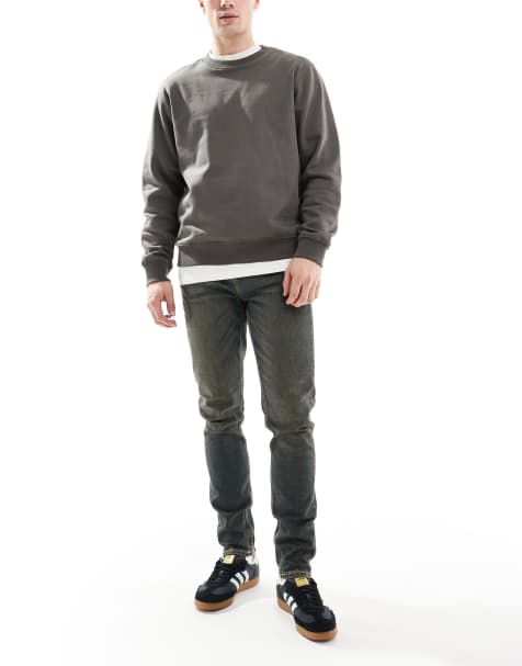 ASOS DESIGN skinny jeans in dark wash blue with tint - view 1