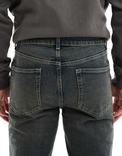 ASOS DESIGN skinny jeans in dark wash blue with tint, 4 of 5