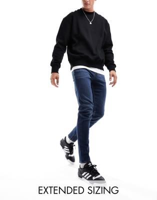 ASOS DESIGN skinny jeans in dark wash blue - ASOS Price Checker