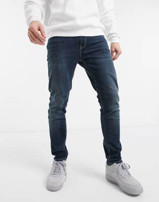 ASOS DESIGN skinny jeans in dark wash-Blue