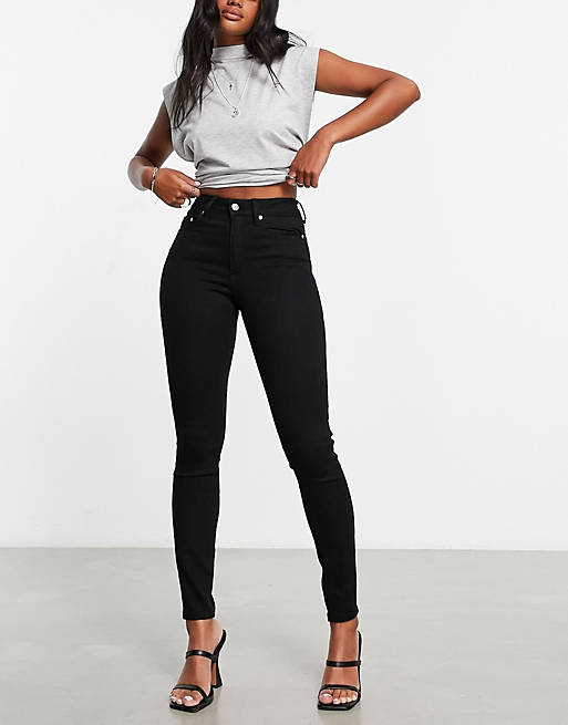 ASOS DESIGN - Skinny jeans in effen zwart