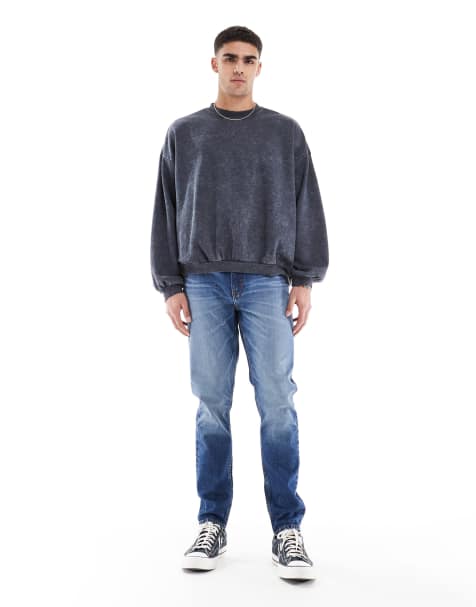 ASOS DESIGN – Skinny-Jeans in getönter, mittelblauer Waschung - view 1