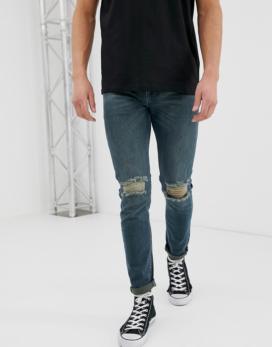 ASOS DESIGN skinny jeans in green cast with knee rips-Blue