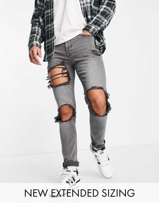 ASOS DESIGN skinny jeans in grey wash with heavy rips