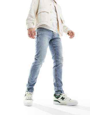 ASOS DESIGN skinny jeans in light blue wash with abrasions - ASOS Price Checker