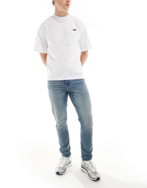 ASOS DESIGN skinny jeans in light wash blue - view 1