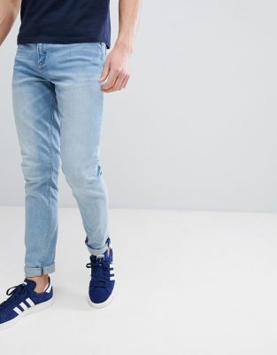 washed blue skinny jeans