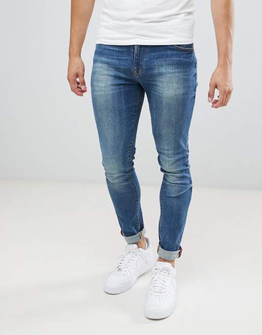 asos design baggy jeans in mid wash blue