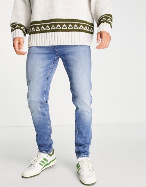 FhyzicsShops DESIGN skinny jeans in mid wash blue with abrasions