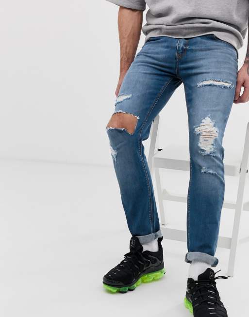 asos design baggy jeans in vintage blue wash with tint