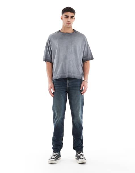 ASOS DESIGN skinny jeans in mid wash blue - view 1