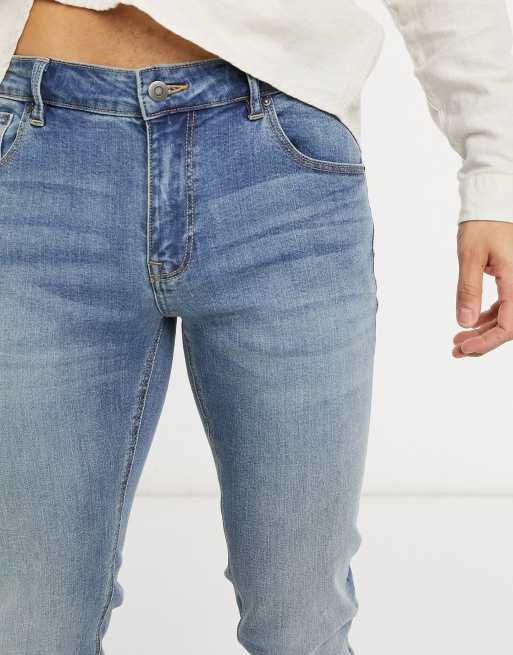 ASOS DESIGN skinny jeans in mid wash, 3 of 4