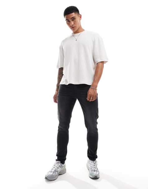 ASOS DESIGN – Skinny-Jeans in verwaschenem Schwarz - view 1