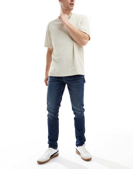 ASOS DESIGN skinny jeans in vintage dark tint wash blue