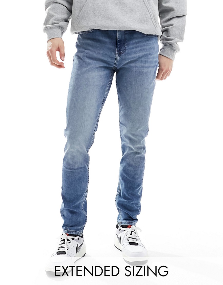 ASOS DESIGN skinny jeans in vintage light wash blue