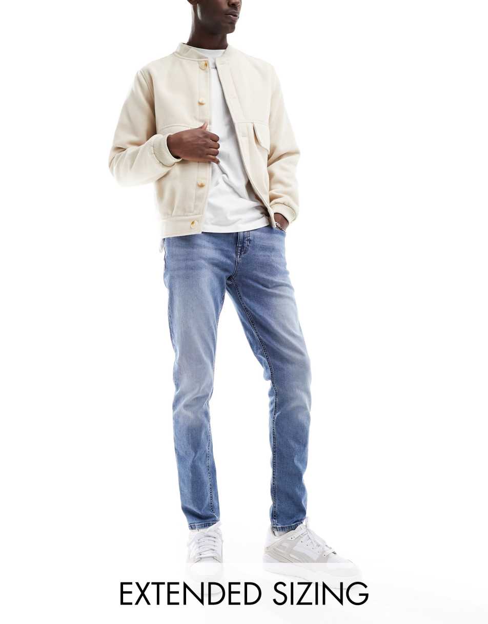 ASOS DESIGN skinny jeans in vintage mid blue