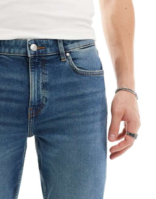 ASOS DESIGN skinny jeans in vintage mid tint, 5 of 5