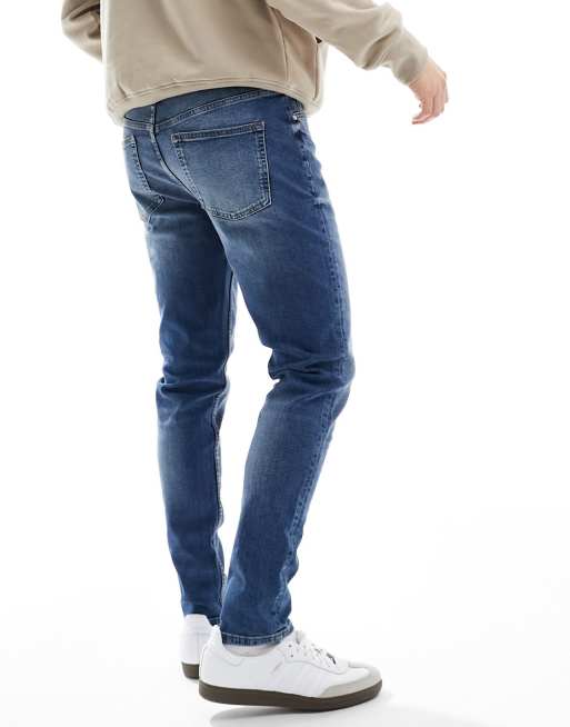 ASOS DESIGN skinny jeans in vintage mid wash blue ASOS