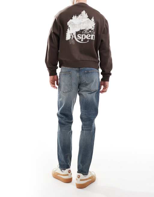 ASOS DESIGN skinny jeans in vintage mid wash