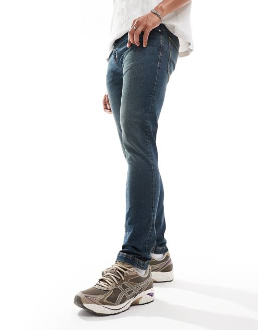 ASOS DESIGN skinny jeans in vintage tint wash blue ASOS