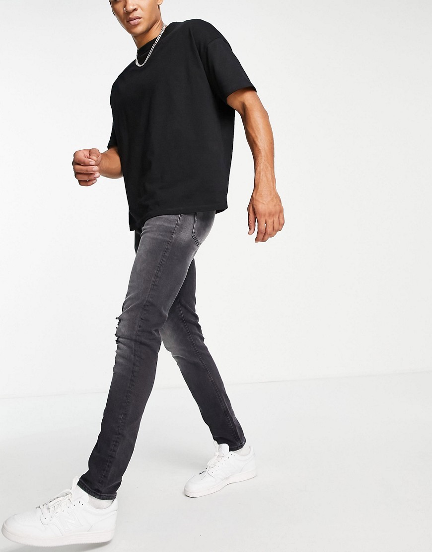 Asos Design Skinny Jeans In Washed Black With Abrasions