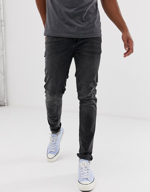 ASOS DESIGN skinny jeans in washed black | ASOS
