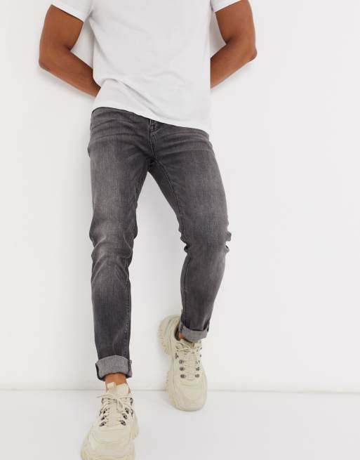 ASOS DESIGN skinny jeans in washed black | ASOS