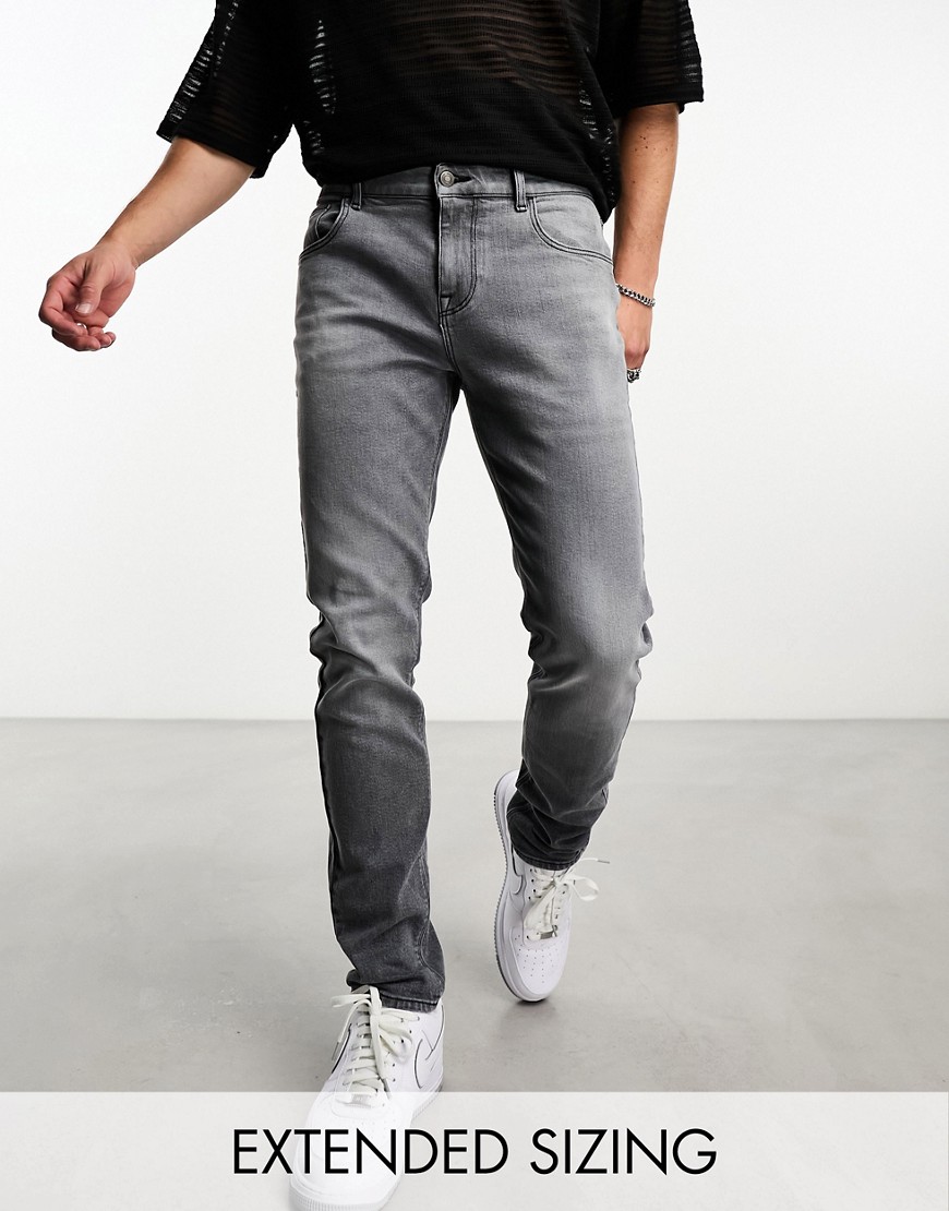 Shop Asos Design Skinny Jeans In Washed Black