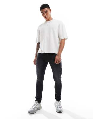 skinny jeans in washed black