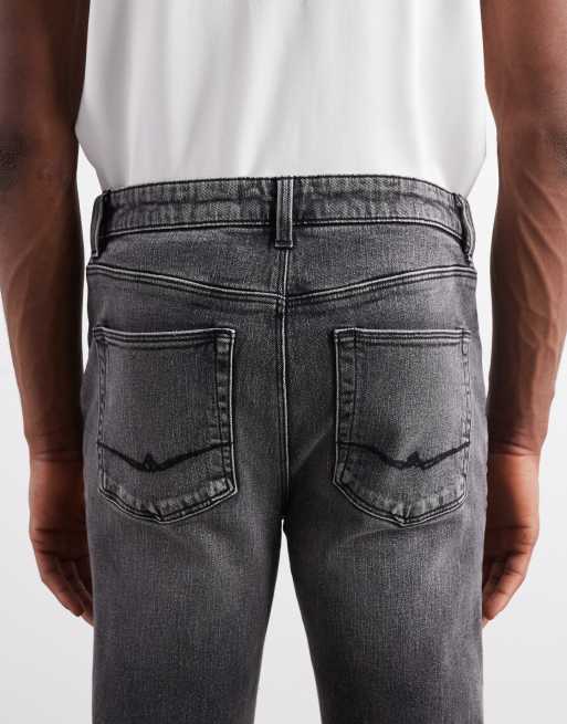 ASOS DESIGN skinny jeans in washed black