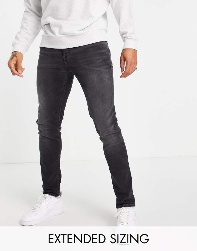 ASOS DESIGN skinny jeans in washed black