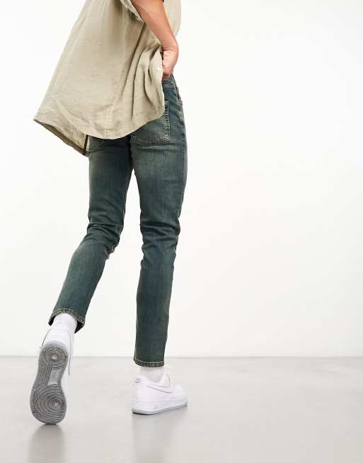 ASOS DESIGN skinny jeans in Y2k heavy tinted mid wash blue, 3 of 4