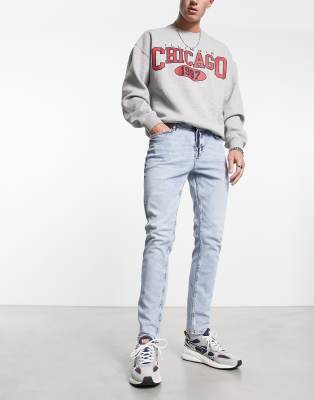 FhyzicsShops DESIGN skinny jeans in Y2k light wash blue