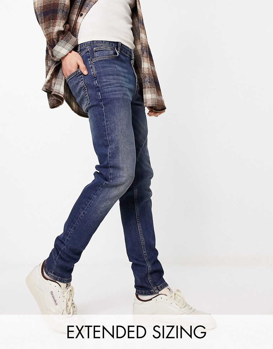 Asos Design Skinny Jeans In Y2k Tinted Dark Wash Blue
