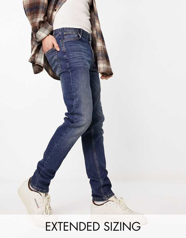 ASOS DESIGN skinny jeans in Y2k tinted dark wash blue