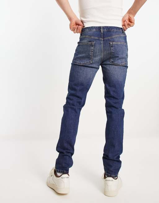 ASOS DESIGN skinny jeans in Y2k tinted dark wash blue