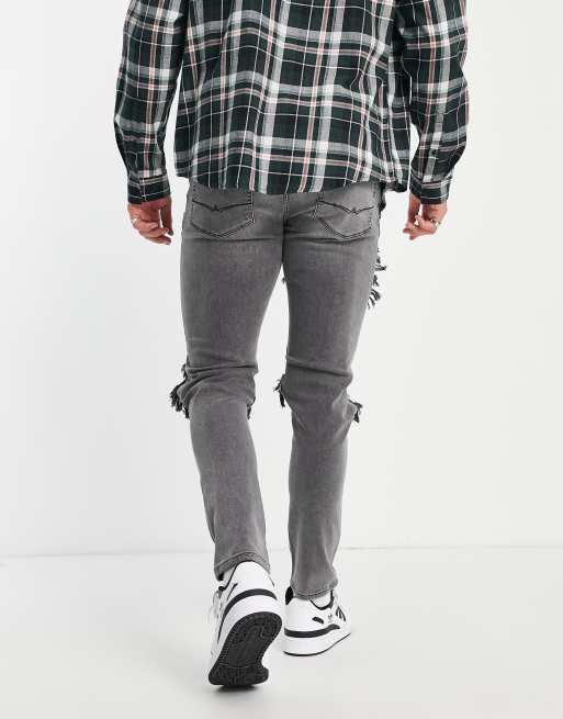 ASOS DESIGN - Skinny jeans met grote scheuren in grijs met wassing, 2 van 4