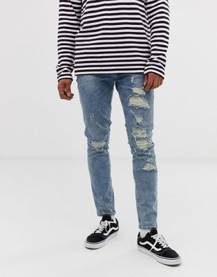 ASOS DESIGN - Skinny jeans met grote scheuren in lichtblauw