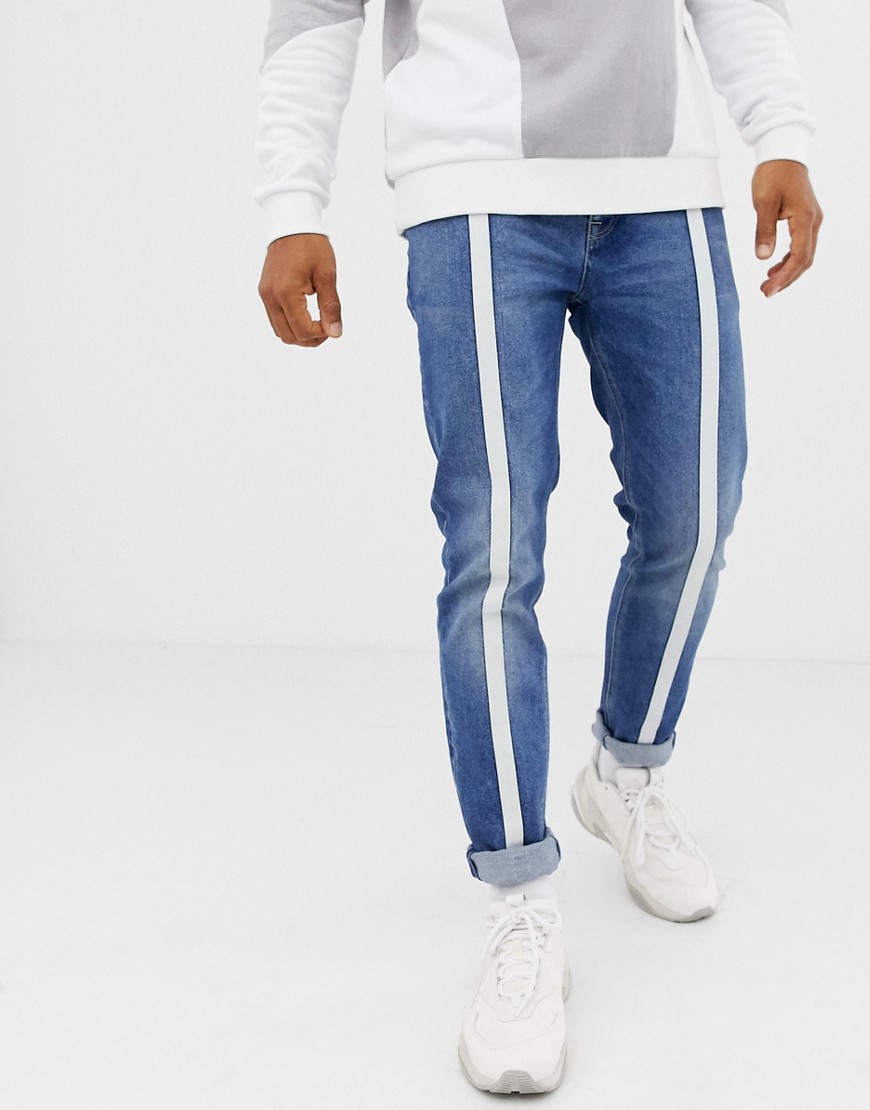 ASOS DESIGN - Skinny jeans met middenblauwe vintage wassing en streep voorop