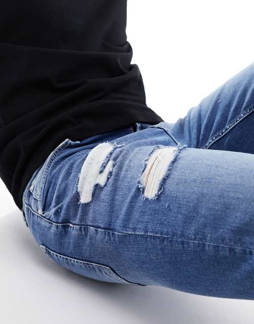 ASOS DESIGN - Skinny jeans met scheuren in mid-wash blauw, 2 van 5