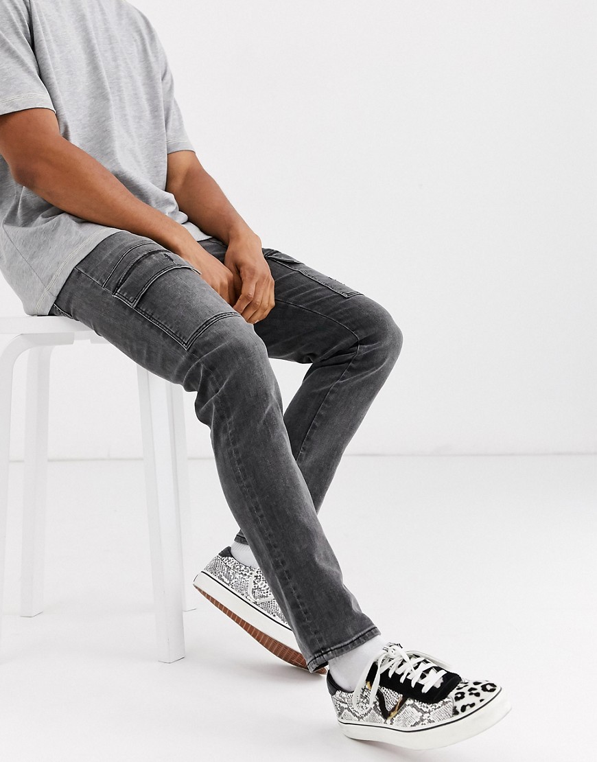 ASOS DESIGN - Skinny jeans met zwarte wassing met cargozakken