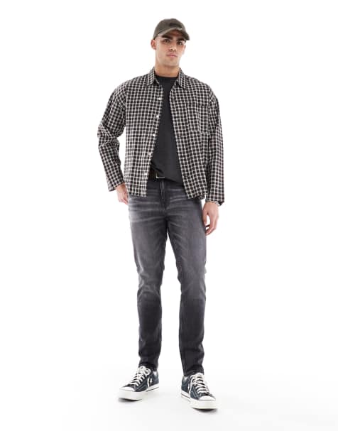 ASOS Design - Skinny jeans met zwarte wassing - view 1