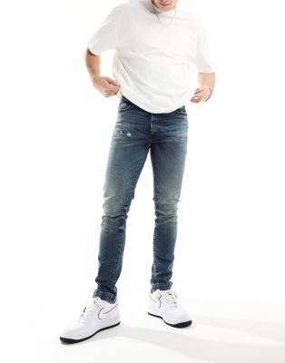 Asos Design Elastic Waist Jeans With Toggles In Mid Wash Blue In Blue