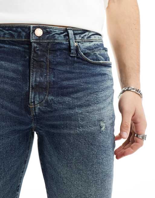 ASOS DESIGN skinny jeans with abrasions in dark wash blue, 5 of 5