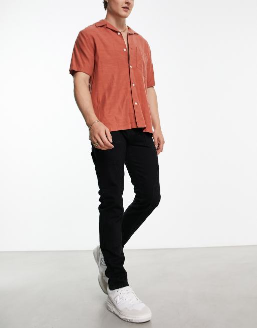 ASOS DESIGN skinny jeans in red