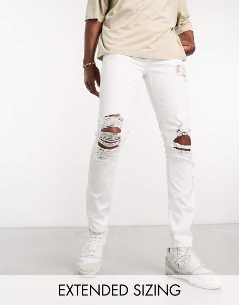 ASOS DESIGN skinny jeans with heavy rips in white - view 1