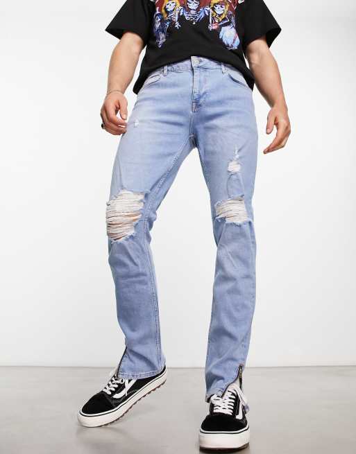 ASOS DESIGN skinny jeans with knee rips and zip in light blue | ASOS